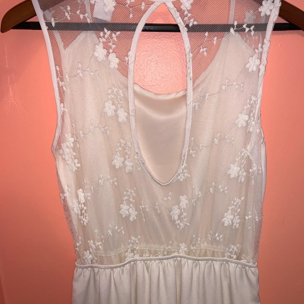 Ivory boutique dress key hole back